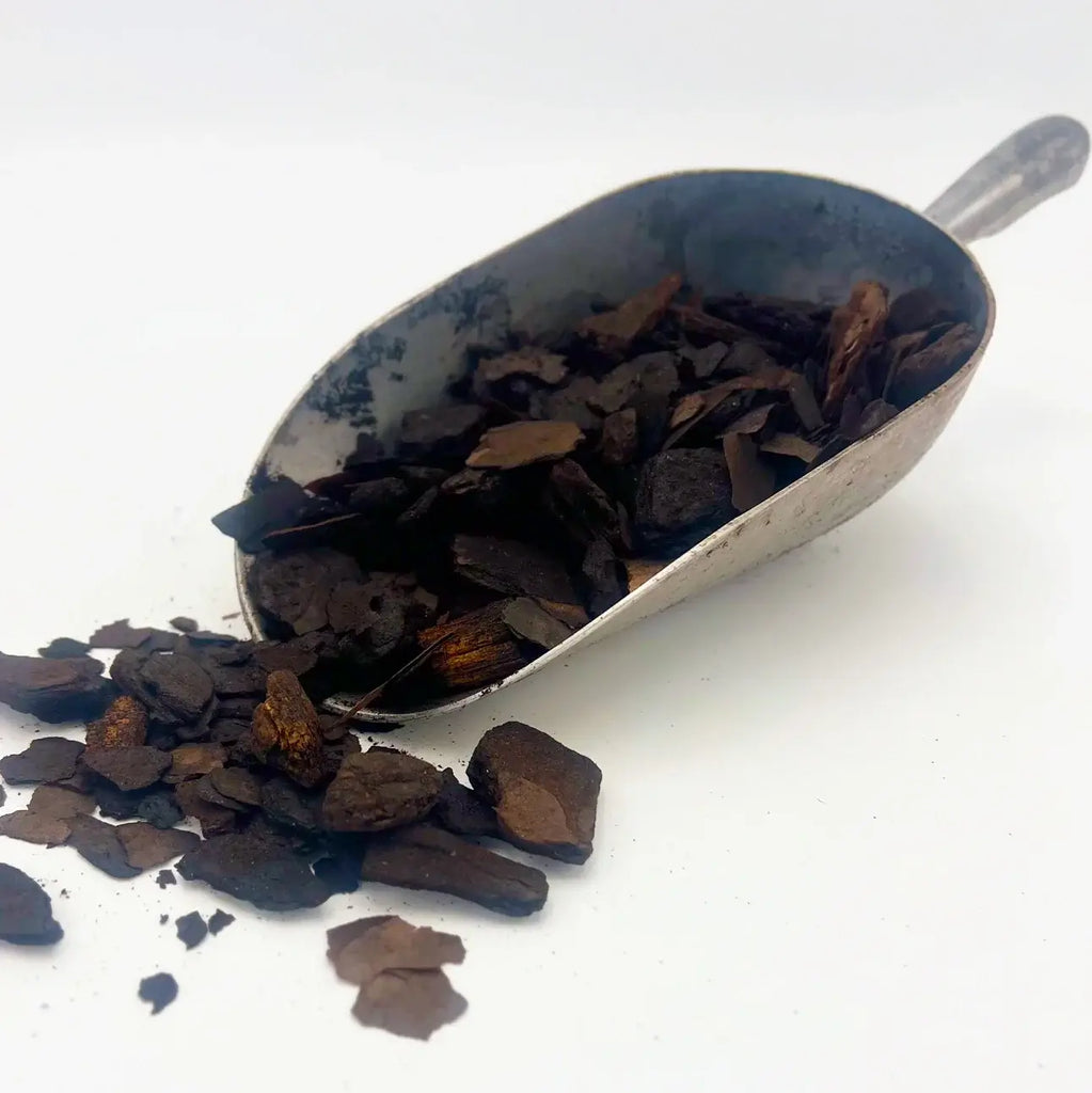 Scoop of premium orchid bark, ideal for rare indoor plants and tropical plant care at Chalet Boutique, Australia.