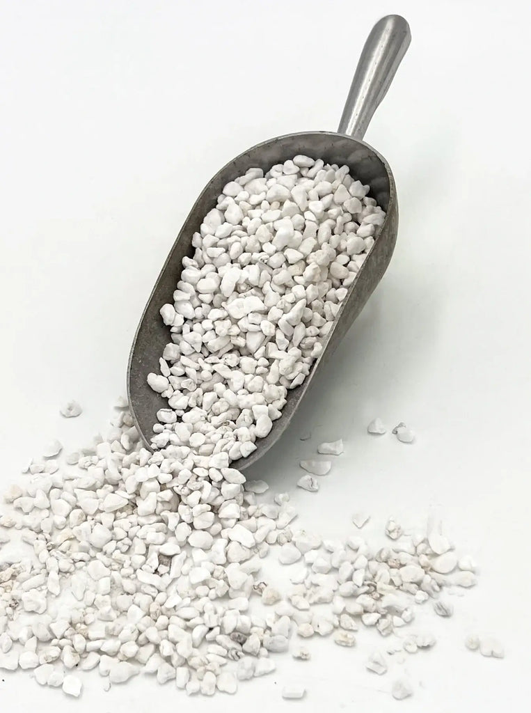 Premium Coarse Perlite in metal scoop, ideal for improving soil aeration and drainage for indoor and outdoor plants, Chalet Boutique, Australia.